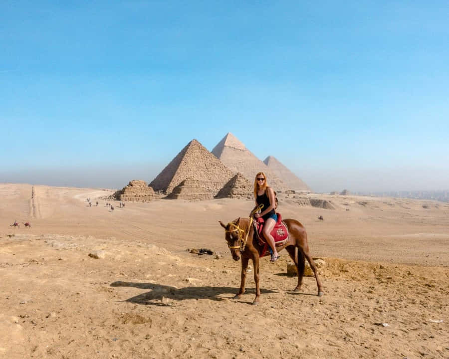 The Pyramids Of Giza Tourist On A Horseback Wallpaper