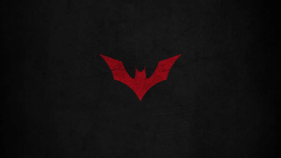 The Red Batman Logo Standing Tall Wallpaper