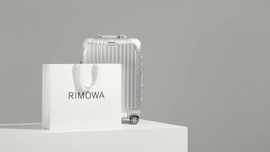 The Sophisticated Silver Rimowa Suitcase Wallpaper