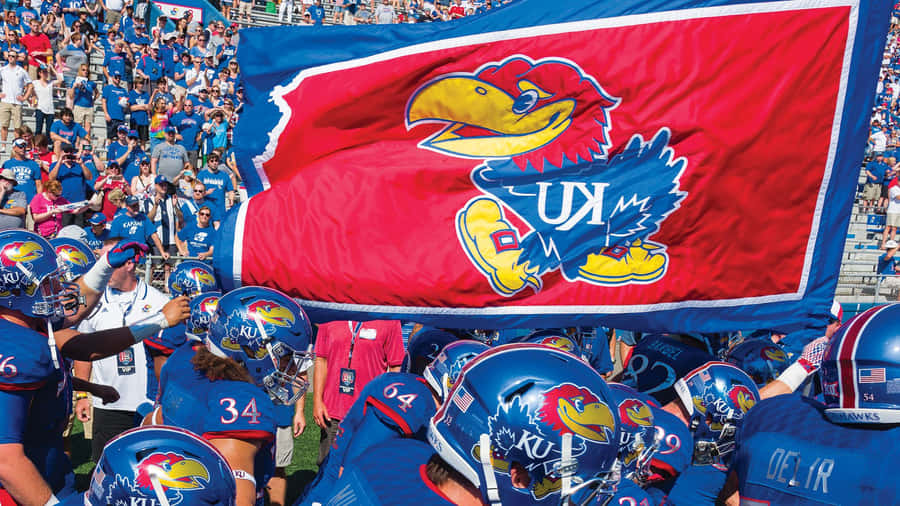The University Of Kansas' Jayhawks Soar In New Heights Wallpaper