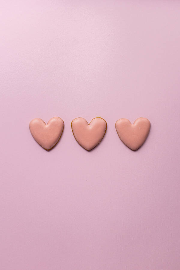 Three Pastel Pink Heart Sugar Cookies Wallpaper