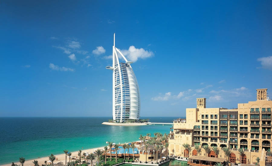 Thrilling View Of The Burj Al Arab Mesmerizing The Dubai Cityscape Wallpaper