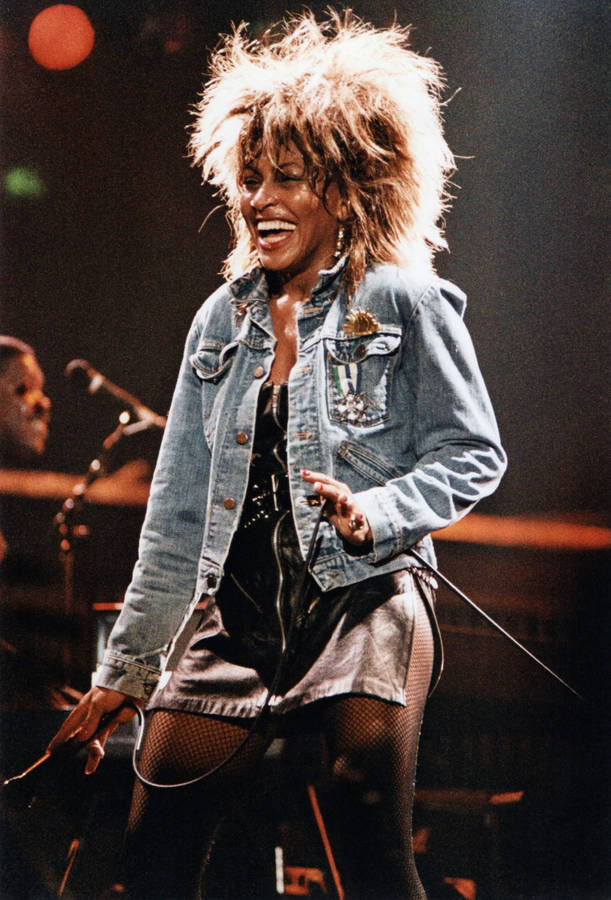 Tina Turner Glows At Punk Rock Performance Wallpaper