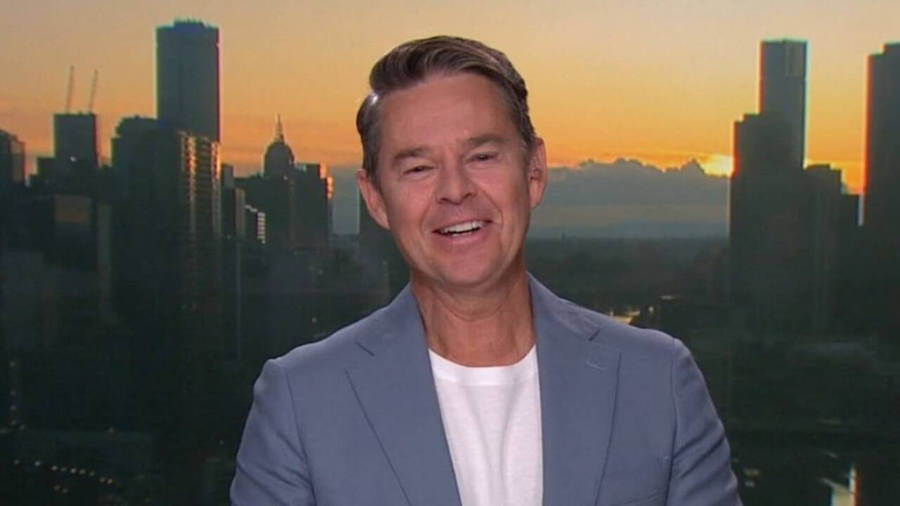 Todd Woodbridge Offering Commentary On Television Wallpaper