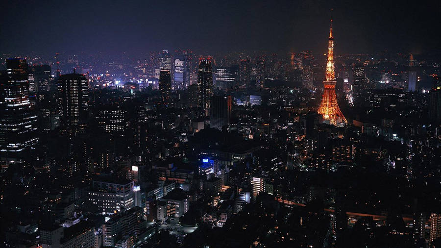 Tokyo Tower Lit Up At Night Wallpaper