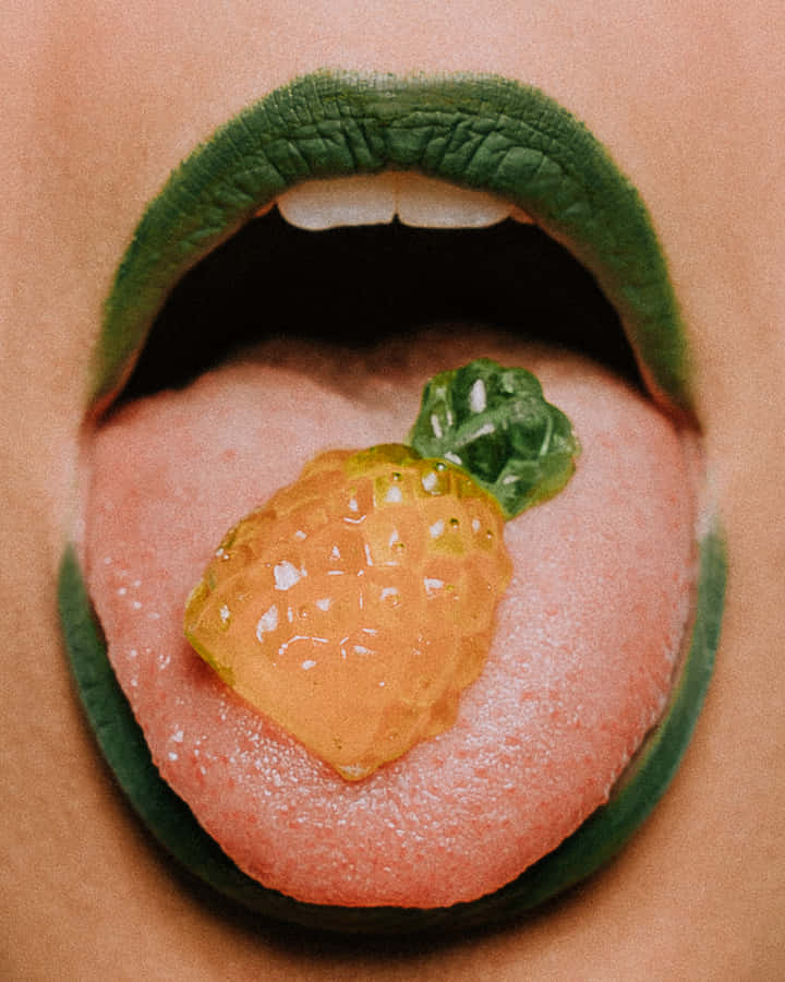 Tongue Out Pineapple Candy Wallpaper