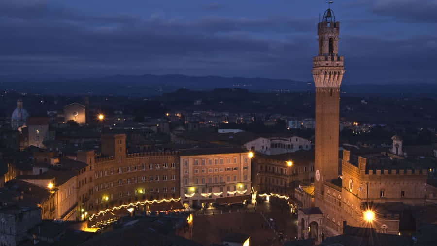Tower Of Mangja In Siena At Night Wallpaper