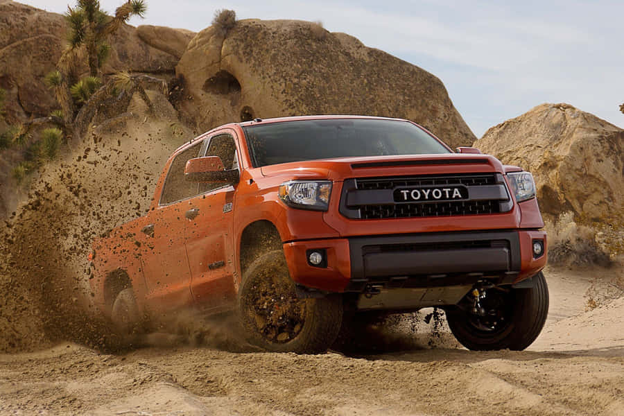 Toyota Trd Driving Through Rough Terrain Wallpaper