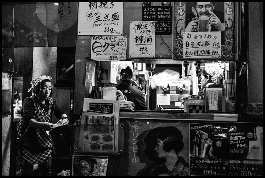 Traditional Japanese Pagodas Basked In The Warm Sun In A Stunning Black And White Scene. Wallpaper