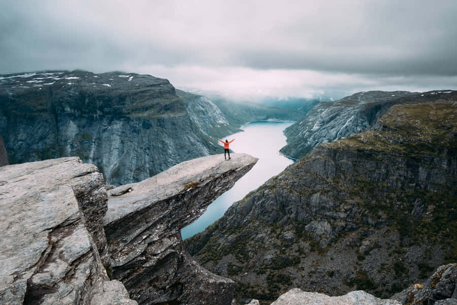 Trolltunga With Dark Grey Rocks Wallpaper