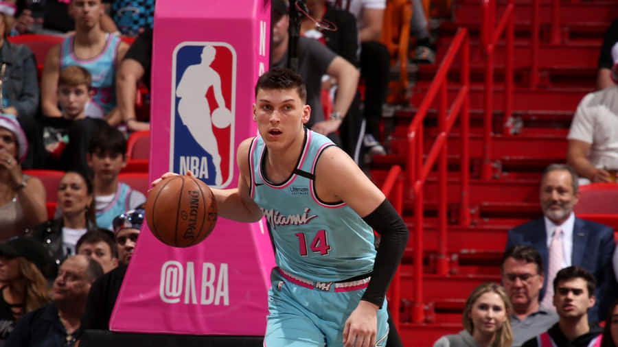 Tyler Herro Showing Off His Shooting Skills Wallpaper