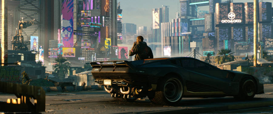 Ultrawide Cyberpunk Man Leaning On A Car Wallpaper
