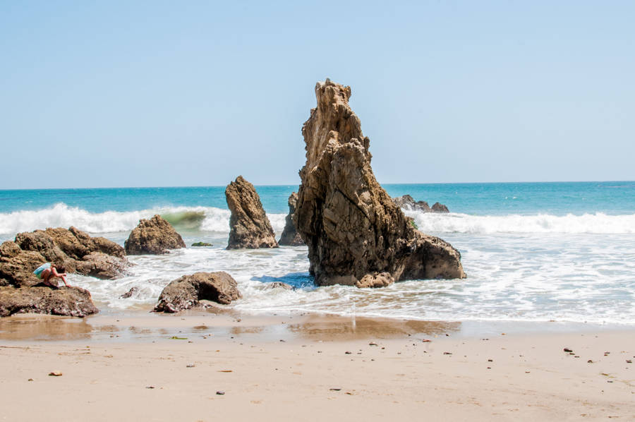 Unique Rock Formations On Malibu Beach Wallpaper