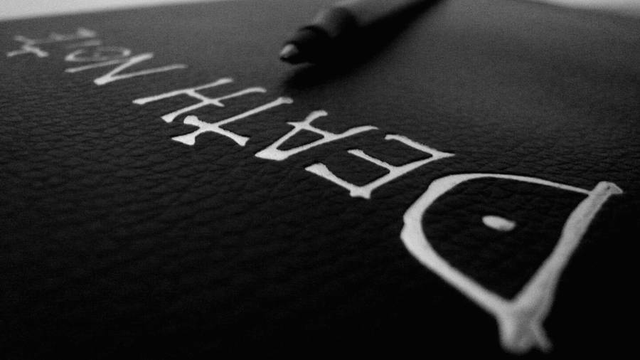 Unlock The Power Of The Death Note With A Simple Pen Wallpaper