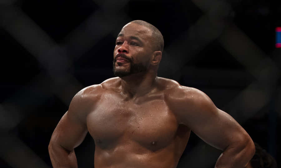Unyielding Determination: A Bruised Rashad Evans After The Fight Wallpaper