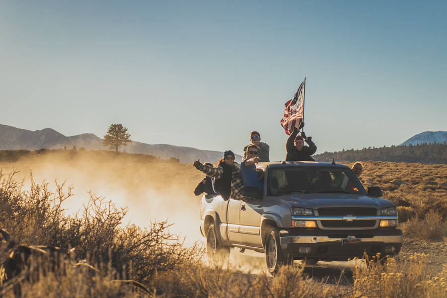 Vibrant, Red 2005 Chevrolet Silverado In An Outdoor Setting Wallpaper