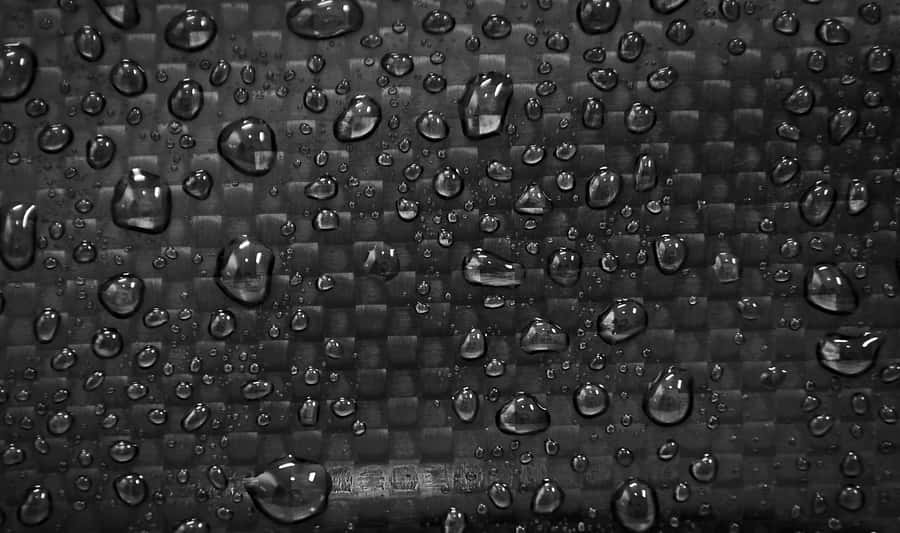 Vibrant Shiny Black Carbon Fiber Wallpaper