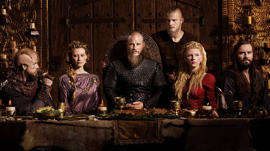 Vikings Posing In Front Of Table Wallpaper