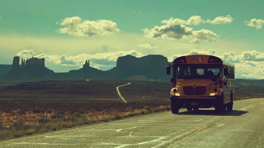 Vintage Desktop School Bus On Road Wallpaper