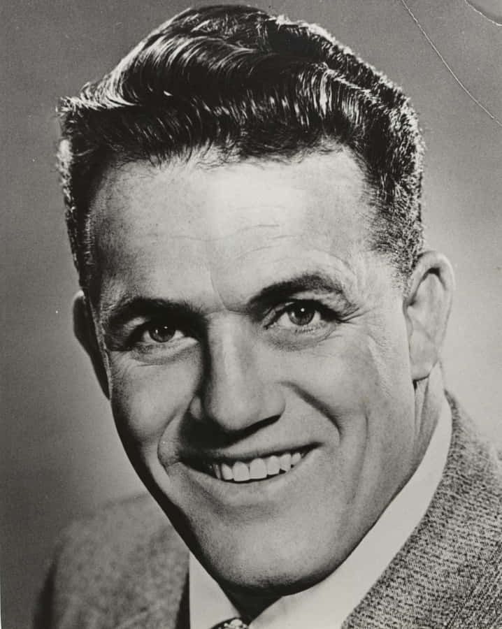 Vintage Portraitof Smiling Man Wallpaper