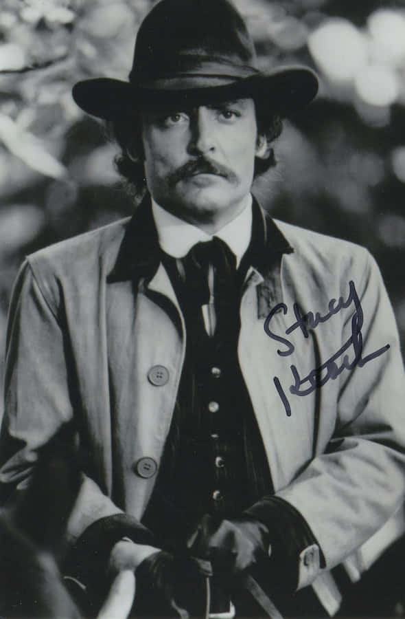 Vintage Styled Man With Hat Autographed Photo Wallpaper