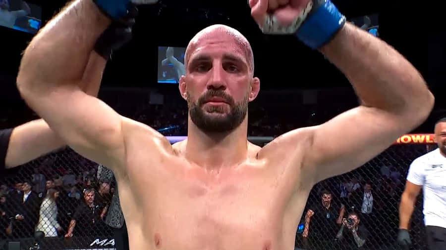Volkan Oezdemir Raising Arms Wallpaper
