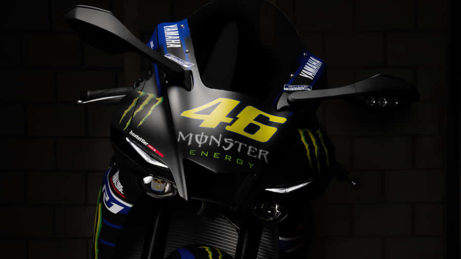 Vr46 Yahama Motorcycle With Monster Energy Logo Wallpaper
