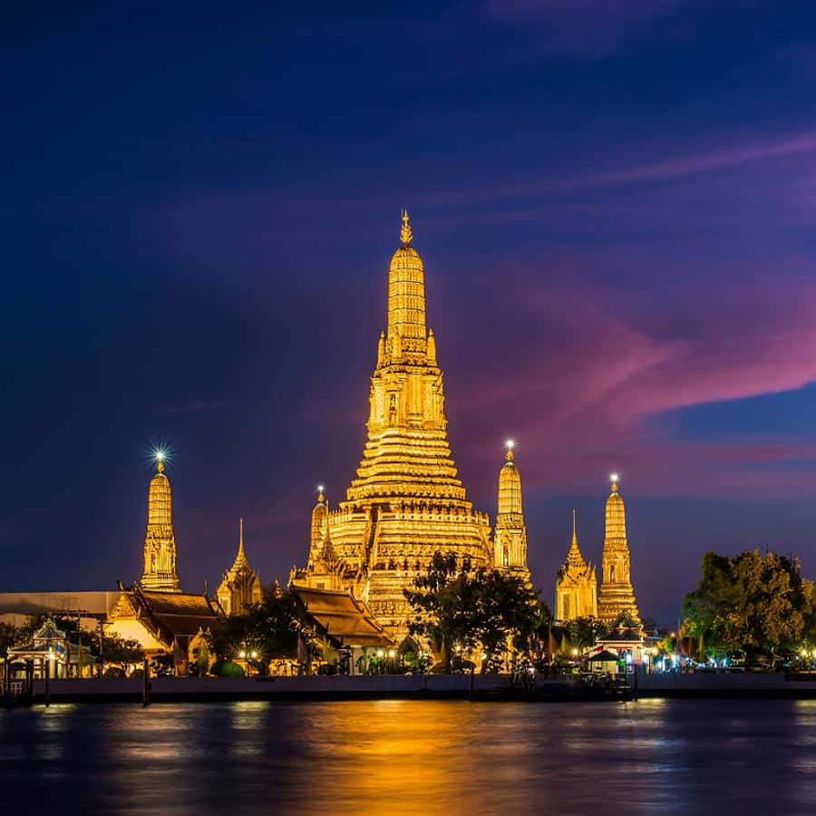 Wat Arun With Yellow Lights Wallpaper