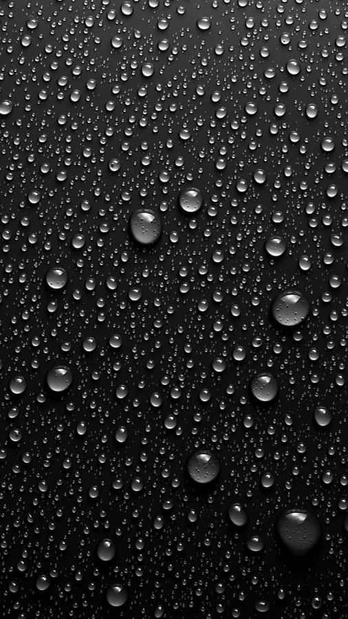 Water Drops On A Black Background Wallpaper