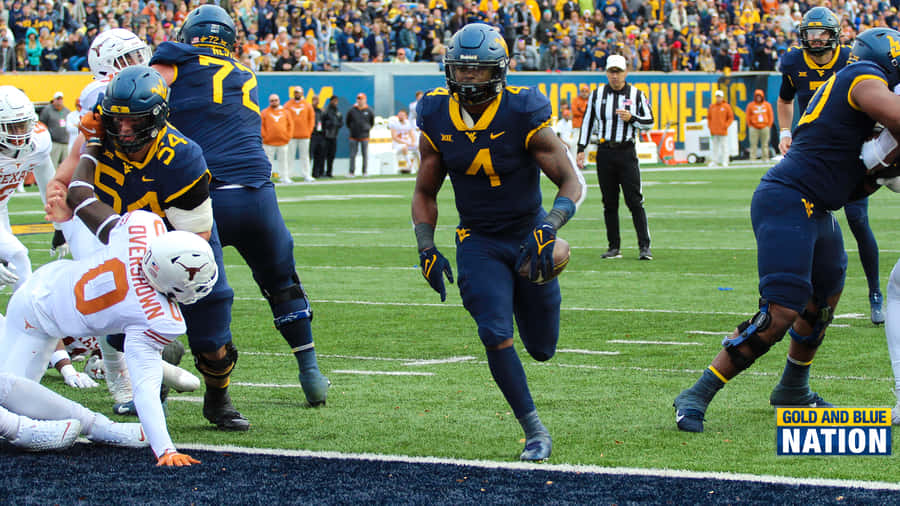 West Virginia Football Seeking Their Next Victory Wallpaper