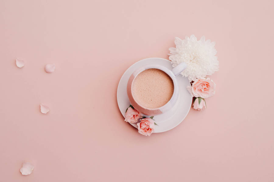 White Glazed Cup With Saucer On Pink Surface Wallpaper
