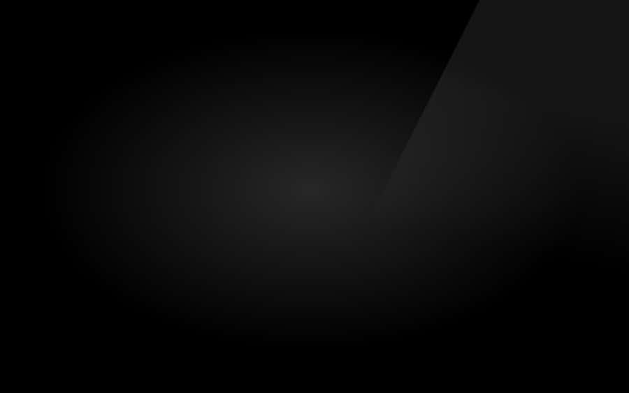 White Hexagons On A Black Gradient Background Wallpaper