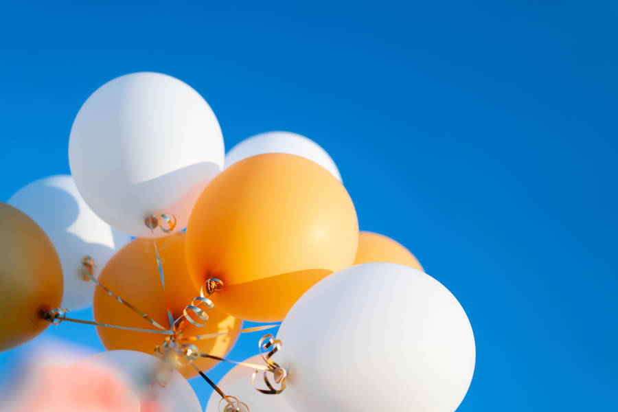 White Orange Tied Up Balloons Wallpaper