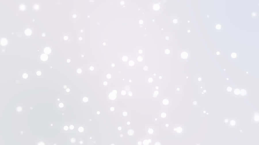 White Snowflakes Falling On A White Background Wallpaper