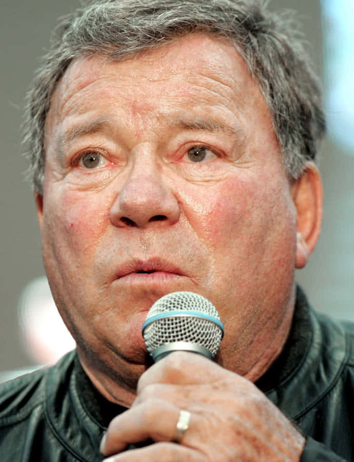 William Shatner Smiling At An Event Wallpaper