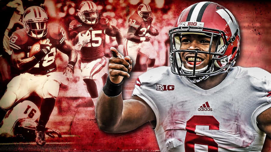 Wisconsin Badgers Football Team In Action At A Packed Stadium Wallpaper