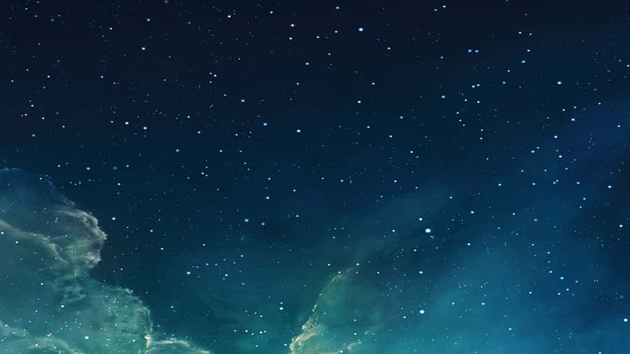 Witness The Beauty Of The Starry Night Sky Wallpaper