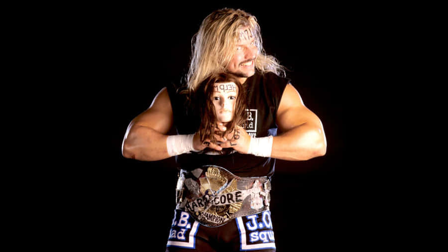 Wrestler_with_ Manikin_ Head_and_ Championship_ Belt Wallpaper