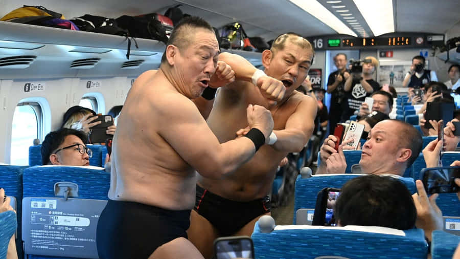 Wrestlers Clashon Train Wallpaper