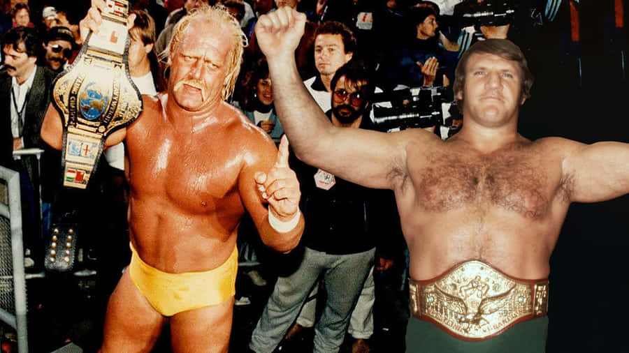 Wrestling Icons Bruno Sammartino And Hulk Hogan In An Intense Face-off. Wallpaper