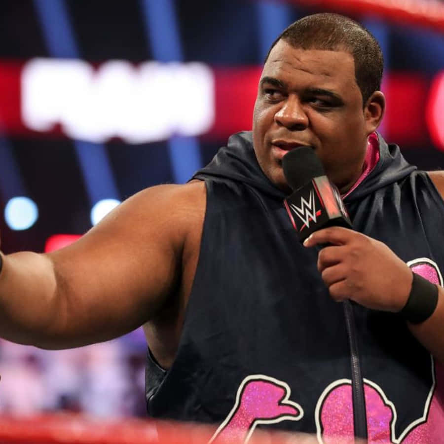 Wwe Superstar Keith Lee Reacting To A Fan's Cheer Wallpaper