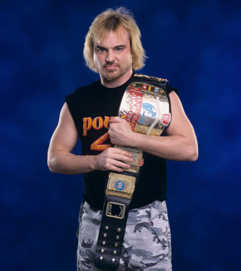 Wwe Wrestler Spike Dudley Triumphantly Holding The European Championship Belt. Wallpaper