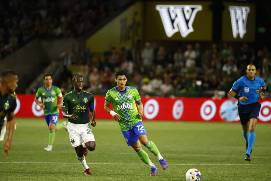 Yimmi Chara In Action During Football Match 2022 Wallpaper