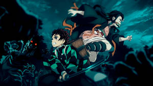 1) Loving Brothers Tanjirou And Nezuko Fight Together Against Demons. Wallpaper