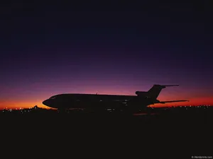 1024x768 Airplane At Sunset Wallpaper