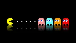 2560x1440 Gaming Pac-man And Ghosts Wallpaper