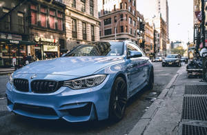 4k Bmw In Street Wallpaper