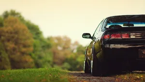 4k Jdm Nissan Silvia On Grassy Field Wallpaper