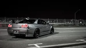 4k Jdm Nissan Skyline In Parking Lot Wallpaper