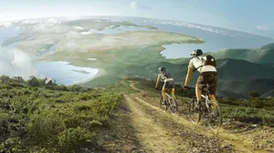 4k Mountain Bike Riders In Crete Greece Wallpaper